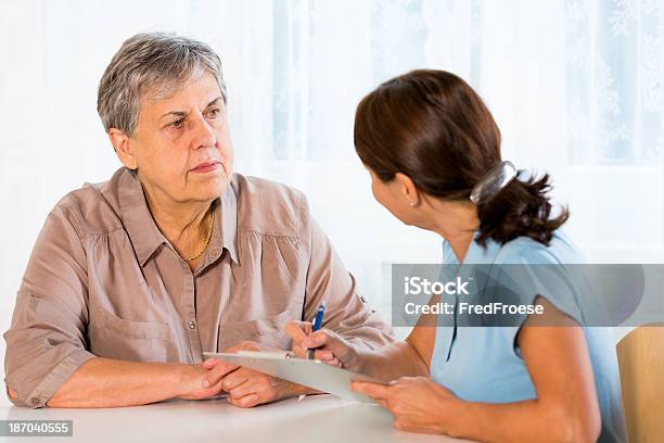 Senior Woman And Psychiatrist Stock Photo - Download Image Now - A Helping Hand, Adult, Adults Only