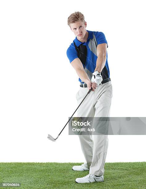 Golfspieler Stehen Mit Golf Club Stockfoto und mehr Bilder von Golf - Golf, Weißer Hintergrund, 18-19 Jahre