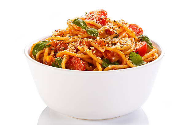 Pasta with meat, tomato sauce, and Parmesan stock photo