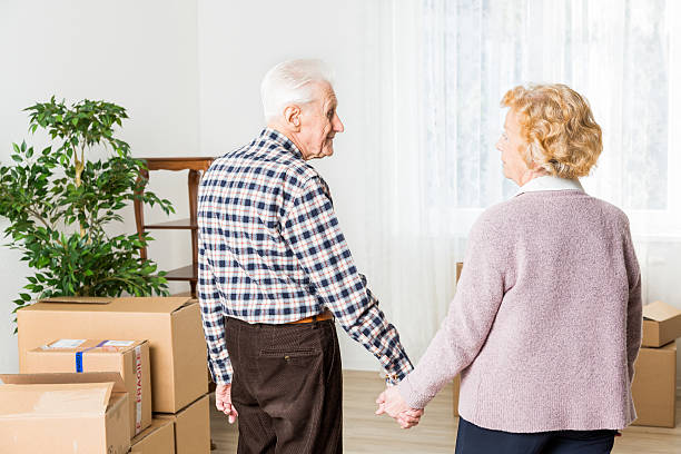 istock Relocation: Senior adult moving house 187041028