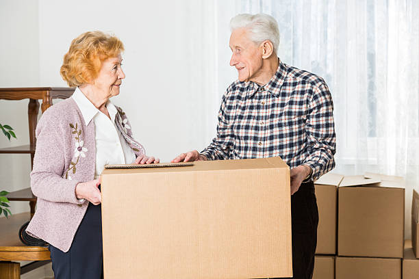 istock Relocation: Senior adult moving house 187041341