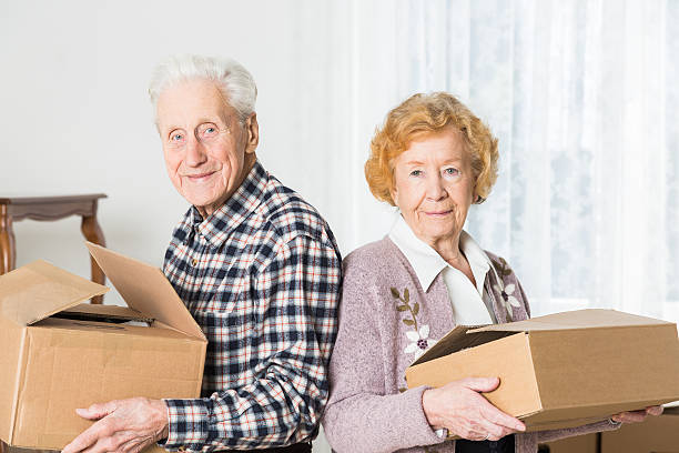 istock Relocation: Senior adult moving house 187041446
