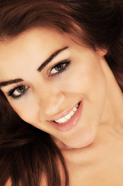 istock Young woman smile 187041639