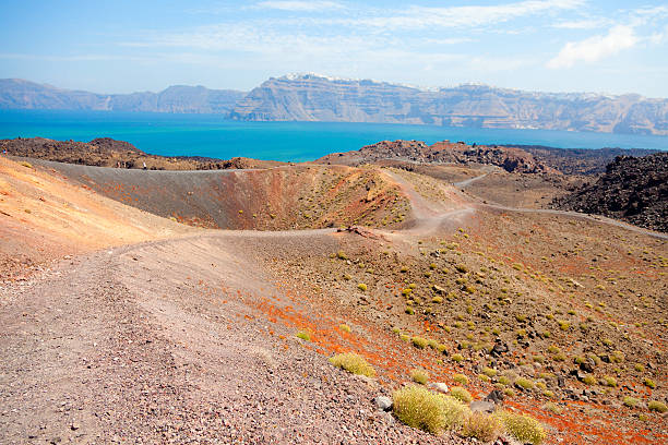 nea kameni vulkanische insel santorin - national landmark editorial color image horizontal stock-fotos und bilder