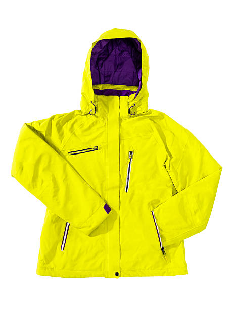 Winter breathable yellow ski jacket isolated on white Winter unisex ski jacket, sport jacket, breathable, windproof, waterproof membrane, in yellow and violet color, isolated on white background. raincoat stock pictures, royalty-free photos & images