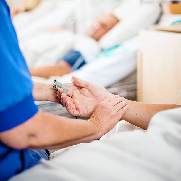 istock Nurse taking care of patient 187042143