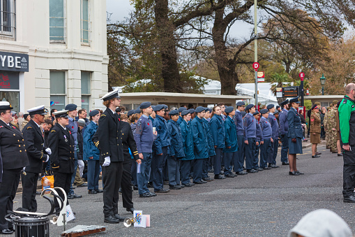 Large group of members of the Fire Brigade Union outside New Scotland Yard at St Patrick's Day Parade, London, Sun 13 March 2022