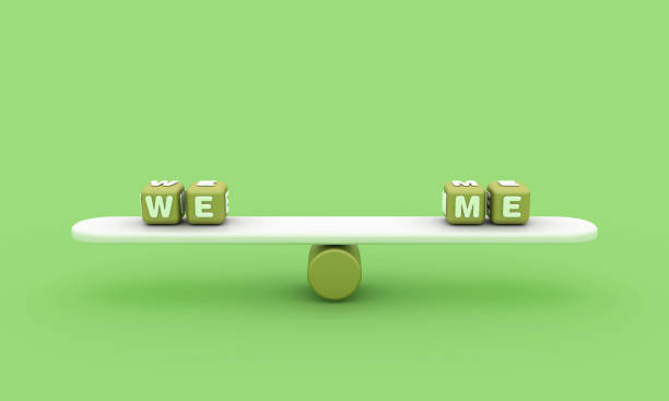 istock Seesaw with WE ME Buzzword Cubes 1870440143