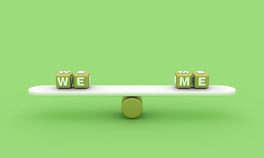 Seesaw with WE ME Buzzword Cubes - Color Background - 3D Rendering
