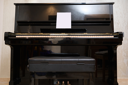 Artificial Intelligence AI Concept Robot Playing Piano.3D Render