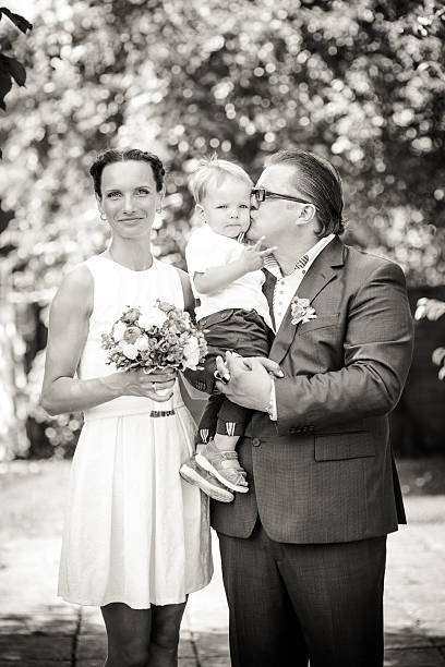istock Happy Newlyweds with their son 187044417