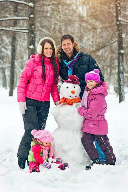 istock Family in a winter park 187044496