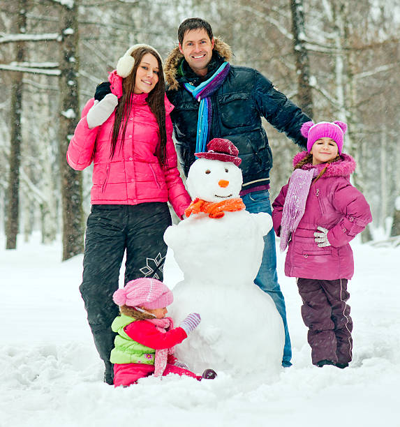 istock Family in a winter park 187044517