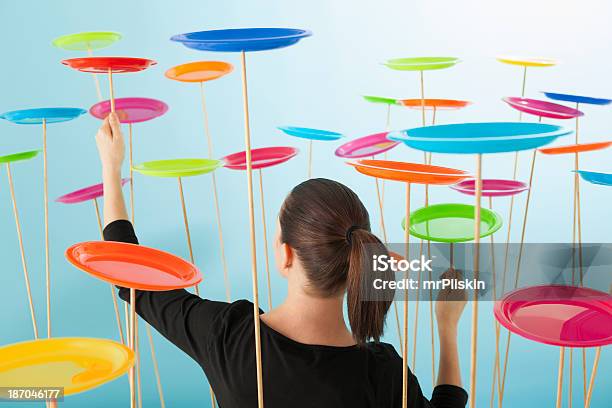 Multi Tasking Coordination And Control Stock Photo - Download Image Now - Multi-Tasking, Plate, Spinning