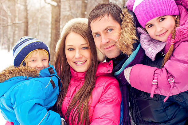 istock Family in a winter park 187046521