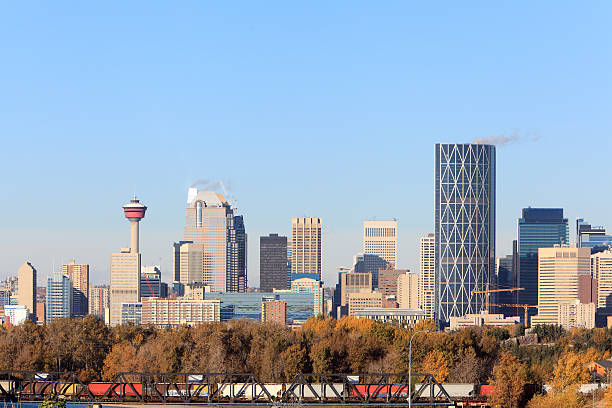 istock Early Morning Fall Calgary Skyline With Train 187046886