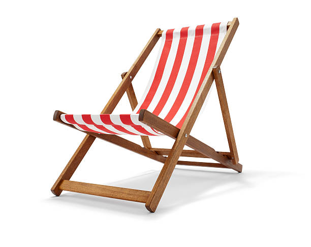 Traditional Deck Chair Studio photo of traditional deck chair with clipping path. deck chair stock pictures, royalty-free photos & images