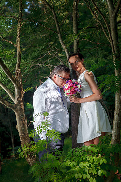 istock Newlyweds in the forest 187047376