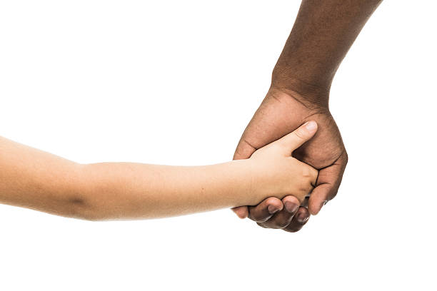 концепция дружбы interracial семьи или - holding hands human hand holding multi ethnic group стоковые фото и изображения