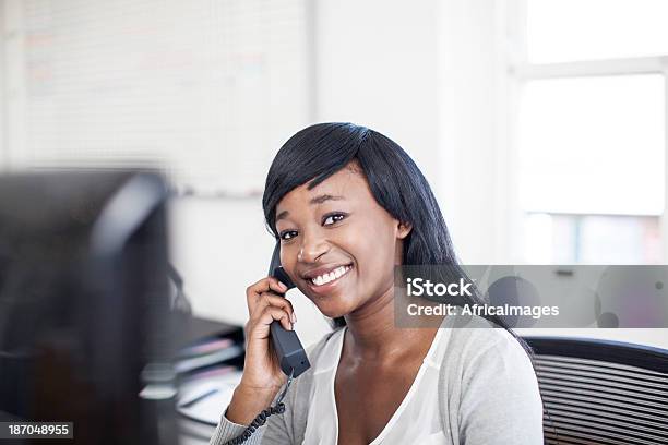 African Costumer Service Representative Stock Photo - Download Image Now - Adult, Adults Only, Africa