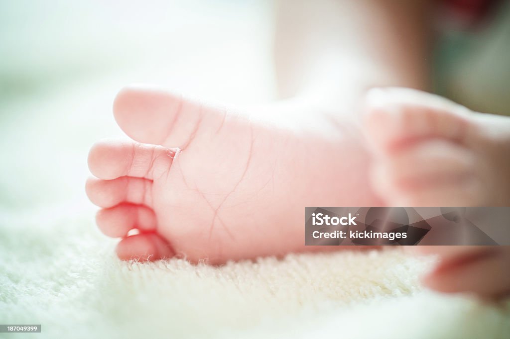 クローズアップの赤ちゃんの足 - 1人のロイヤリティフリーストックフォト