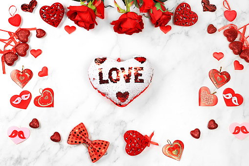 Valentine's Day or Women's Day, Mother's Day concept, banner. Greeting card, red hearts and roses on marble background, happy holiday, birthday greetings, selective focus