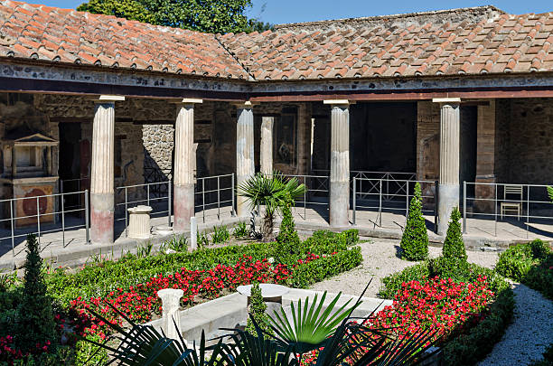 Pompeii is a ruined and partially buried Roman town-city near modern Naples in the Italian region of Campania, in the territory of the comune of Pompei. Along with Herculaneum, its sister city, Pompeii was destroyed, and completely buried, during a long catastrophic eruption of the volcano Mount Vesuvius spanning two days in AD 79.