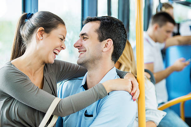 istock Young cheerful couple on the bus. 187050956