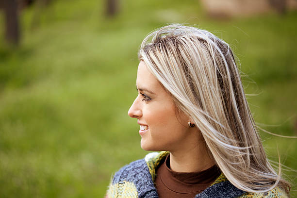 istock young woman looking away 187051436