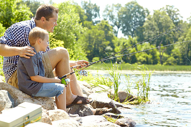 istock Relaxing beside the lake with my son 187051961