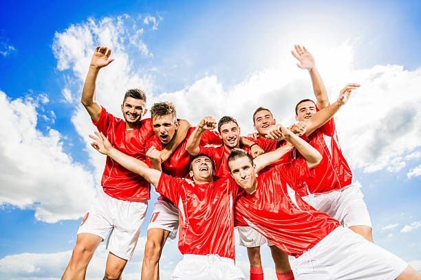 istock Successful soccer team against the sky. 187052435