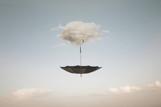 istock surreal cloud carrying an umbrella in the sky, abstract concept 1870530134