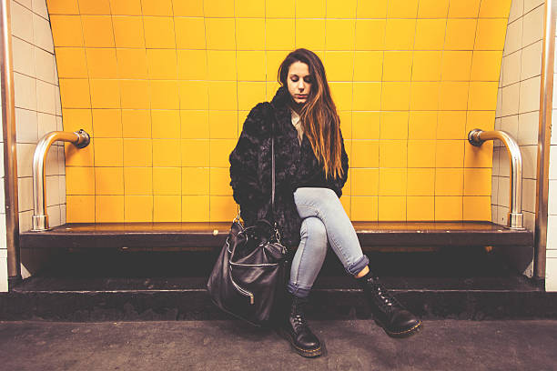istock Young woman waiting the train 187053193