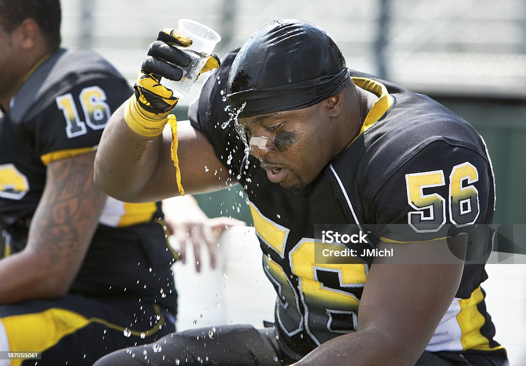 Giocatore di Football americano - Foto stock royalty-free di Acqua