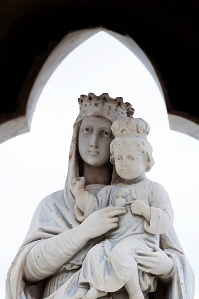 istock Virgin Mary with child Jesus, marble statue, copy space 187055637