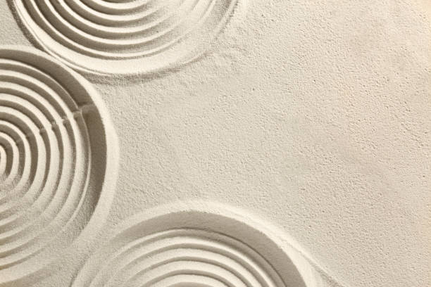istock Beautiful patterns on sand, above view and space for text. Zen garden 1870556517