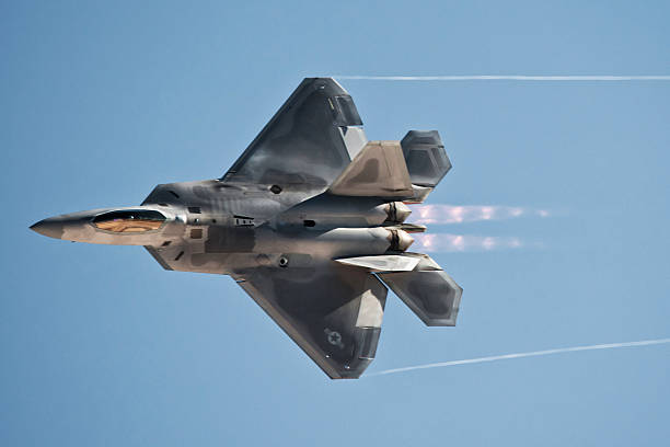 istock Stealth Fighter Jet with Afterburners and Clipping Path 187055847