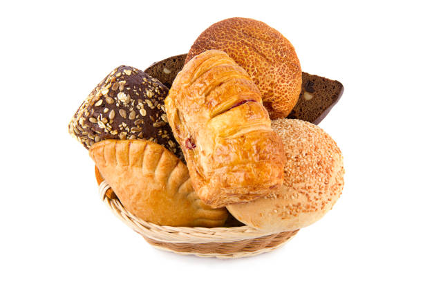 istock Buns and sweet pastries in a wicker basket isolated on white. 1870563263