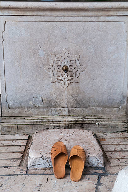 istock Sandals at Fountain Outside Mosque 187056699