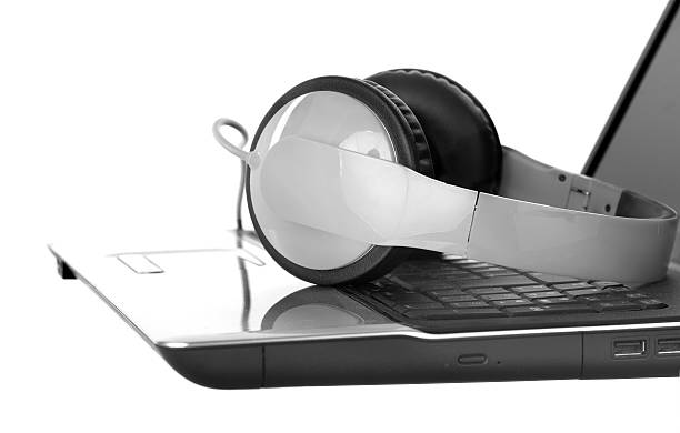istock headphone and laptop on white 187057346