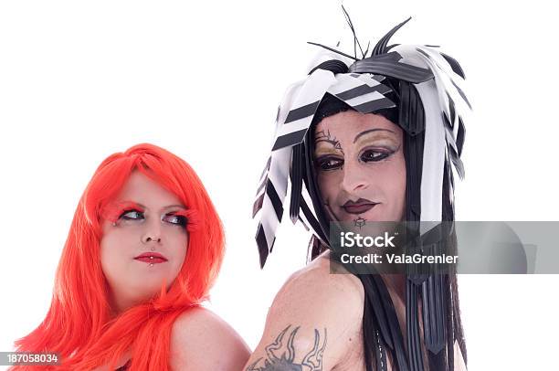 Man In Cybergoth Makeup And Redhead Looking At Each Other Stock Photo - Download Image Now