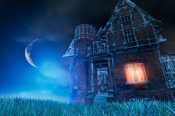 istock Spooky haunted house at night 187058144