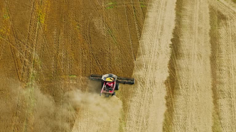 Aerial Shot of Combine Harvester on Farmland in Illinois