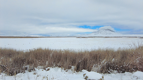 Snowy view of Karatas Lake in Burdu, Turkey.