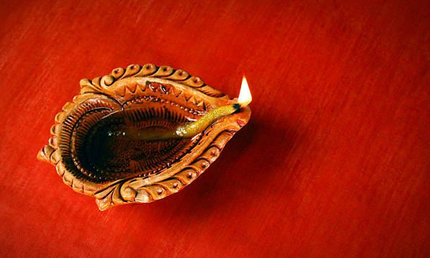 istock Diya on grungy surface - Concept of celebration 187061027