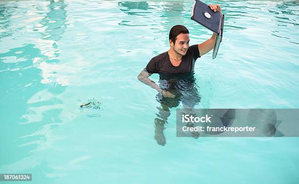 Man Surfing On The Swimmingpool Stock Photo - Download Image Now - Adult, Bizarre, Communication
