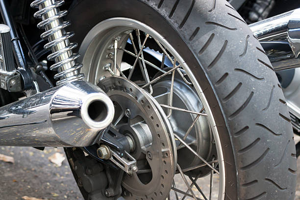istock Rear view of motorcycle wheel and exhoust pipe 187062213
