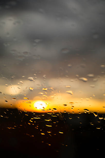 istock beautiful evening sunset through wet glass 187062490