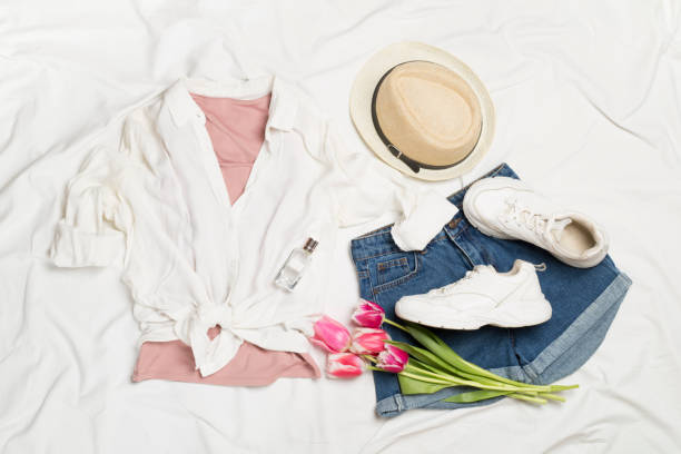 istock Stylish summer outfit on white sheet background, top view 1870626154