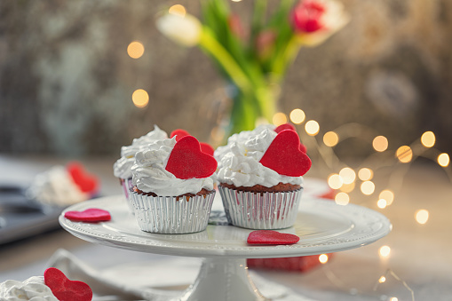 Love concept decorated cupcakes served on the plate for Valentine's Day